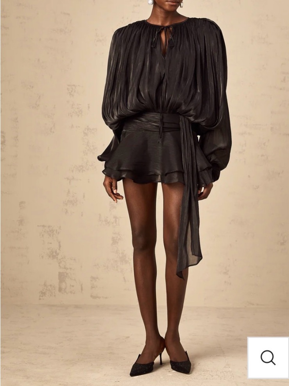 This Miss Rosier Eugénie black mini dress features dramatic balloon sleeves